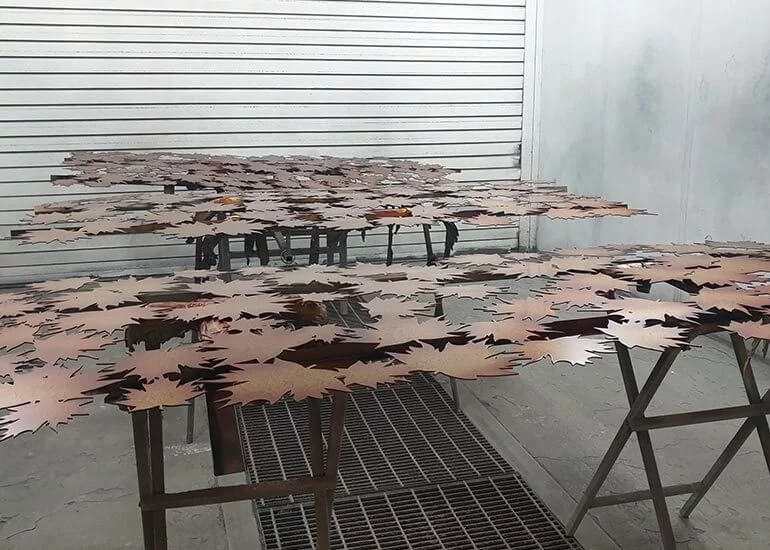 leaf metalwork panels in spray booth