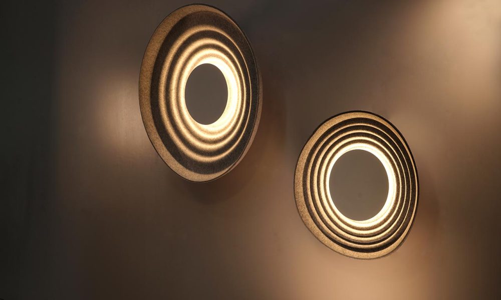 Contemporary circular acoustic wall lighting.