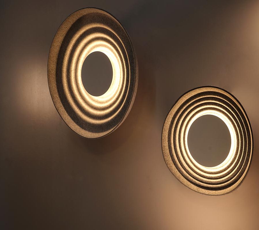 Contemporary circular acoustic wall lighting.
