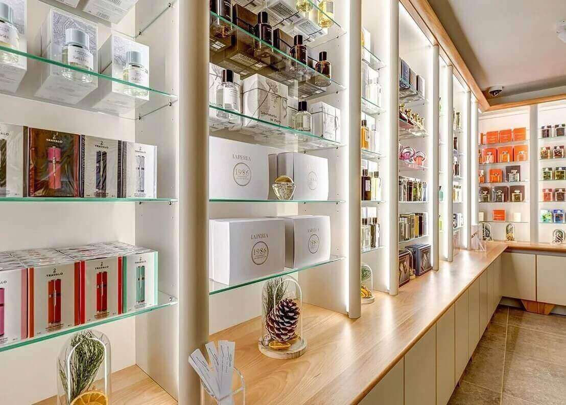 Perfumery with LED strip lighting shelves.