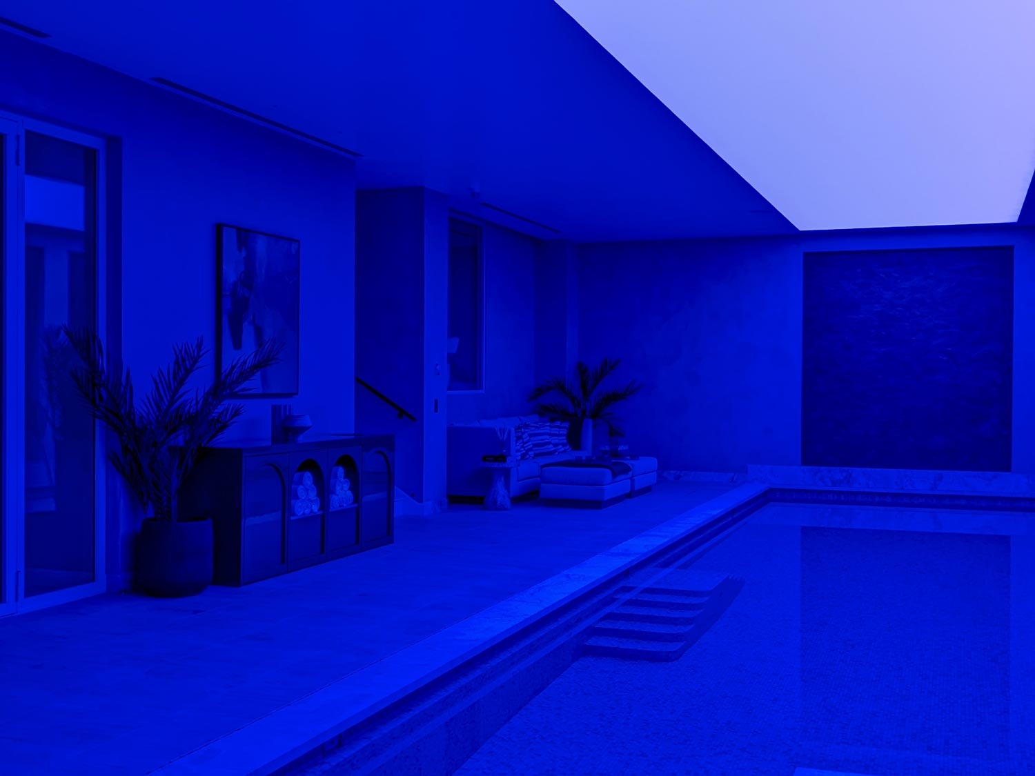 Dark blue lit swimming pool