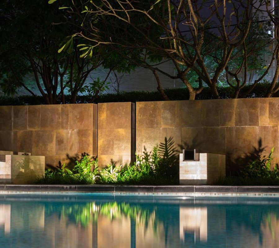 outdoor swimming pool with garden lighting