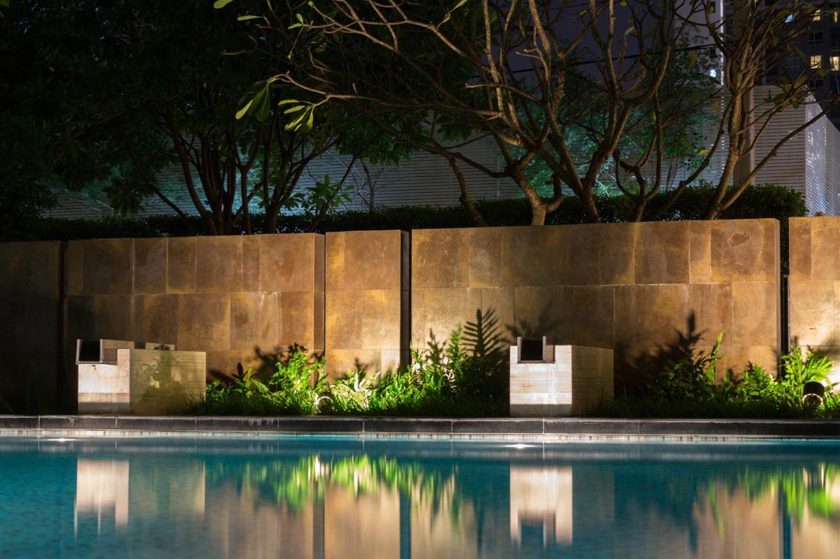 outdoor swimming pool with garden lighting